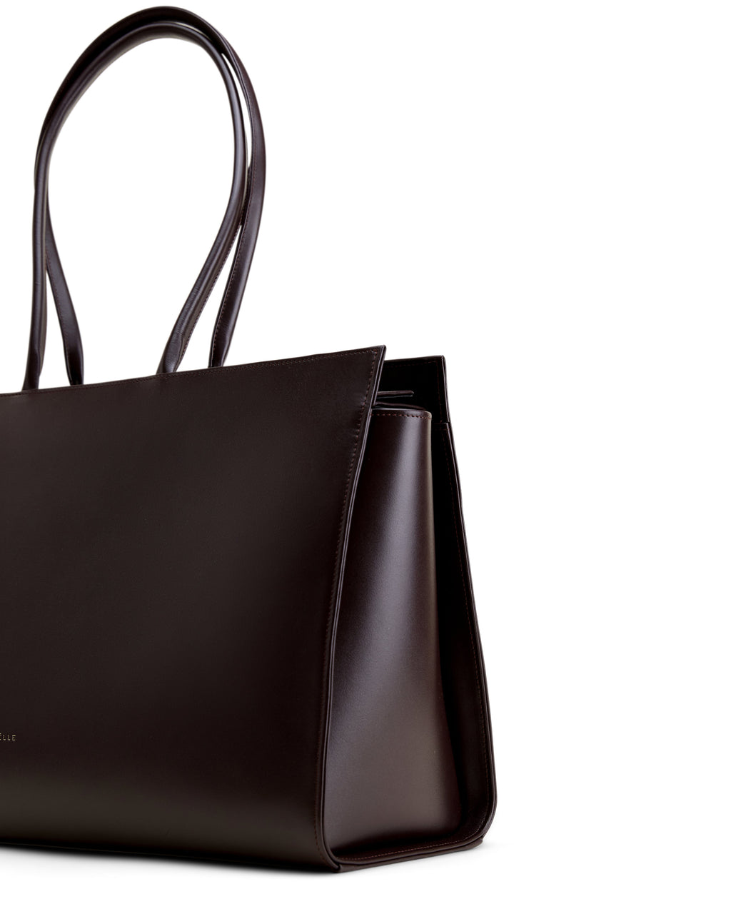 Poelle Atelier luxury brown tote bag with sleek leather finish and double shoulder straps