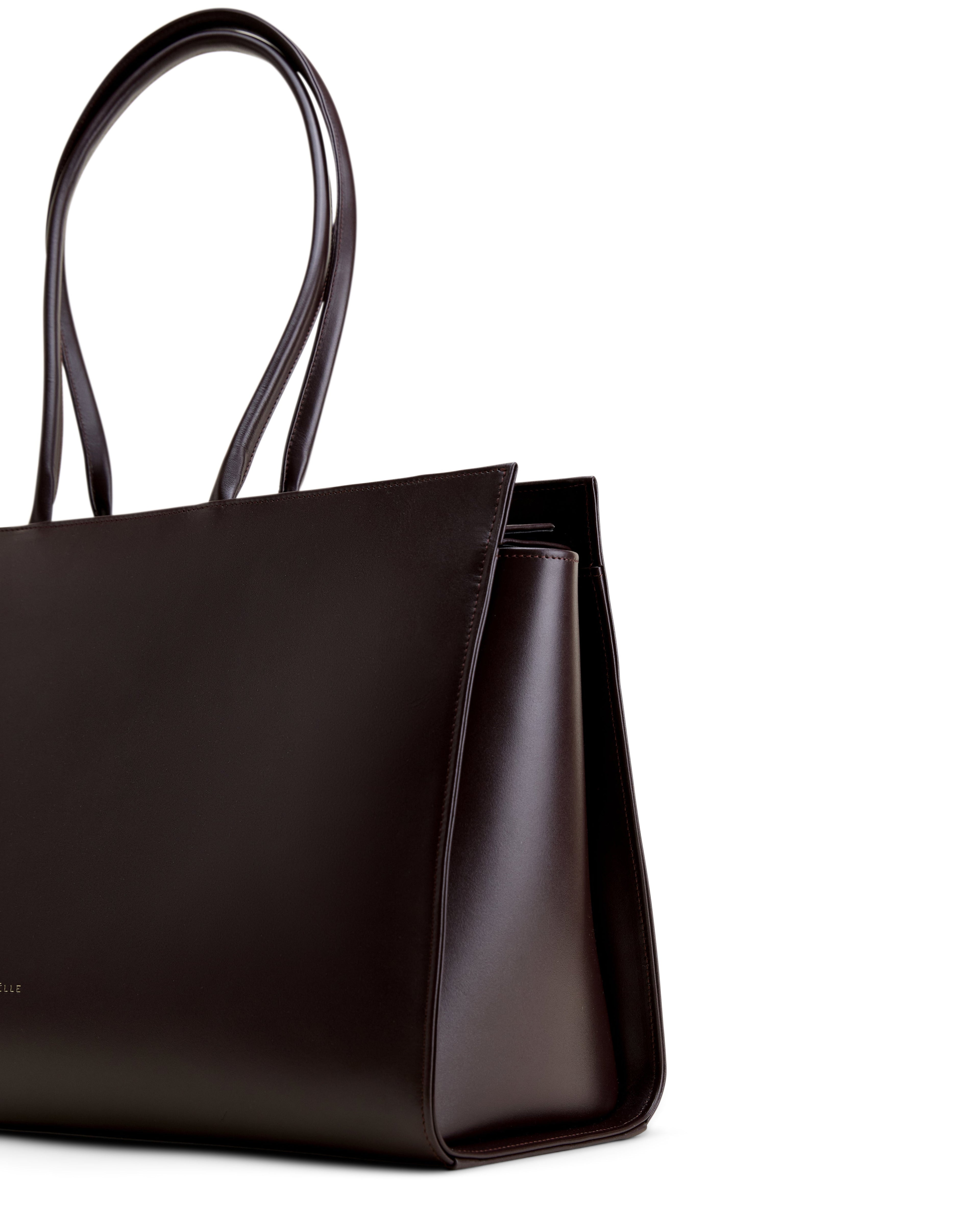 Poelle Atelier luxury brown tote bag with sleek leather finish and double shoulder straps