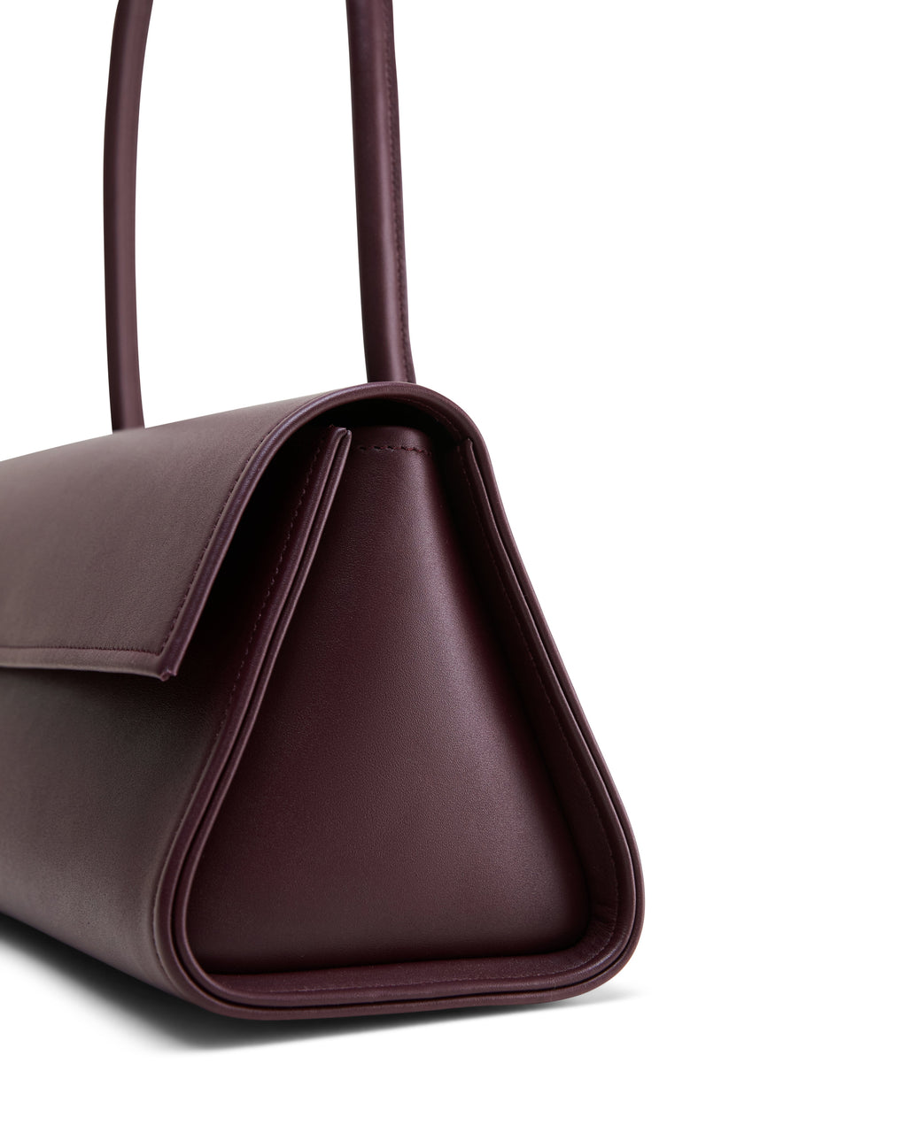 Poelle Atelier high-end fashion leather bag in deep burgundy with sleek triangular design
