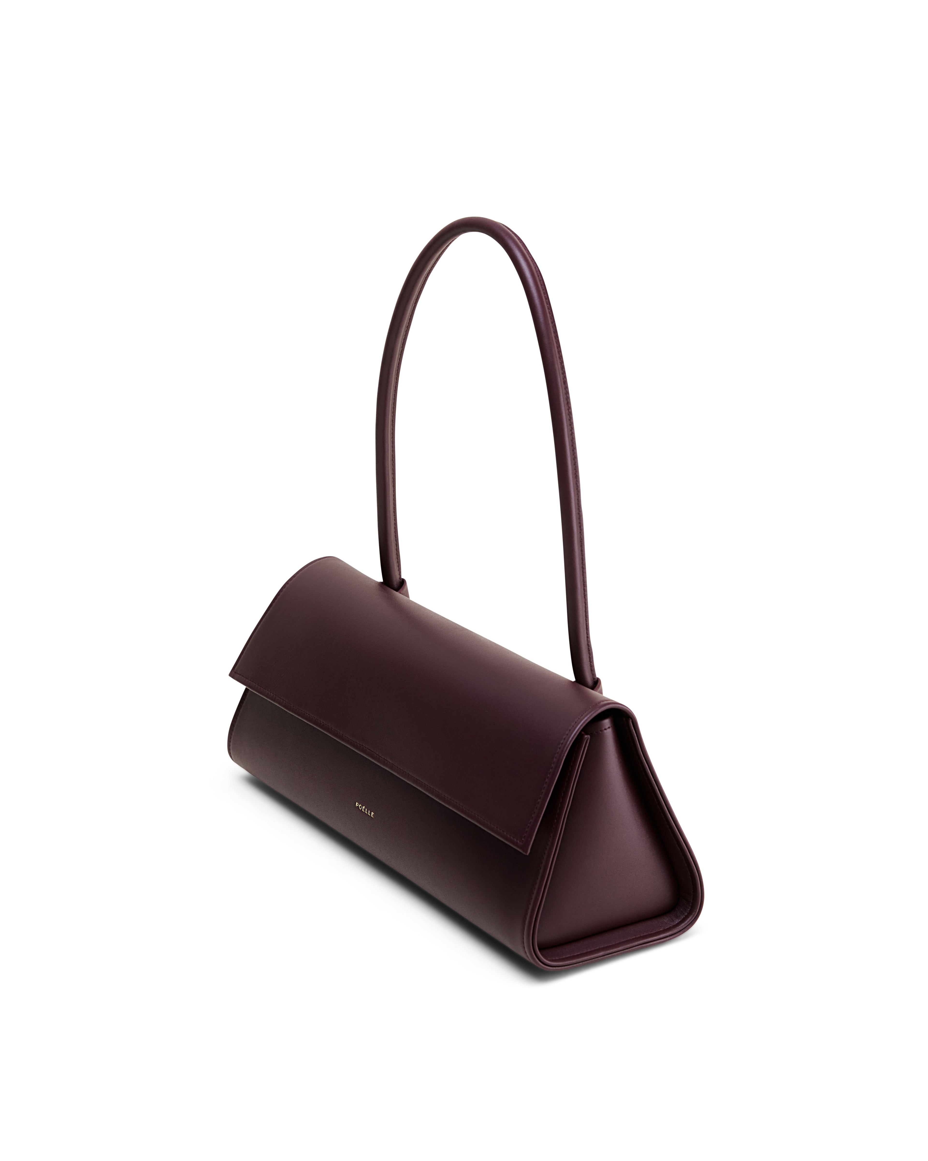 Poelle Atelier high-end fashion leather bag in dark brown with a sleek triangular design and top handle